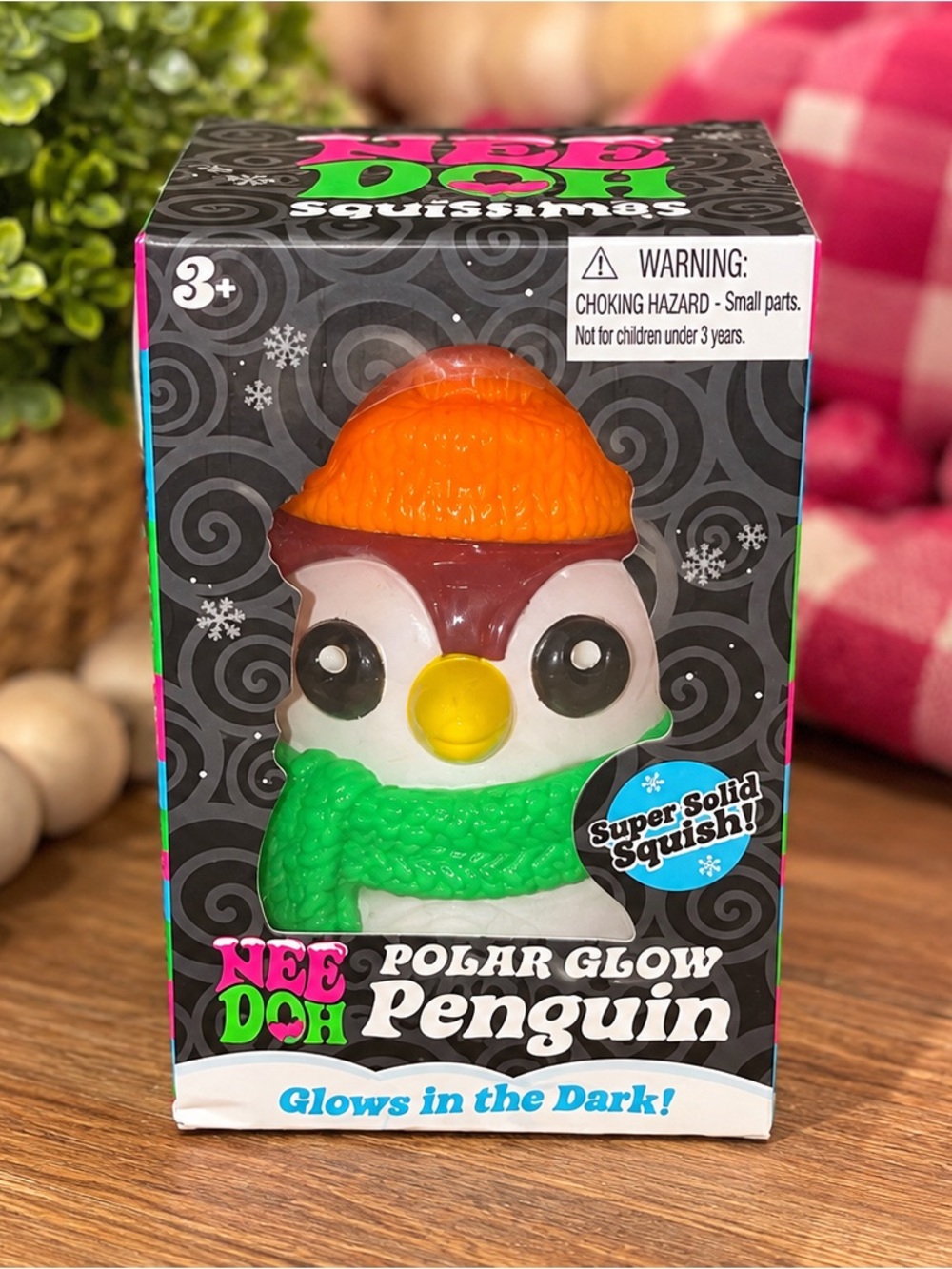 NeeDoh Polar Glow Penguin Squishy Toy - Pink. Orange Hat, Green Scarf